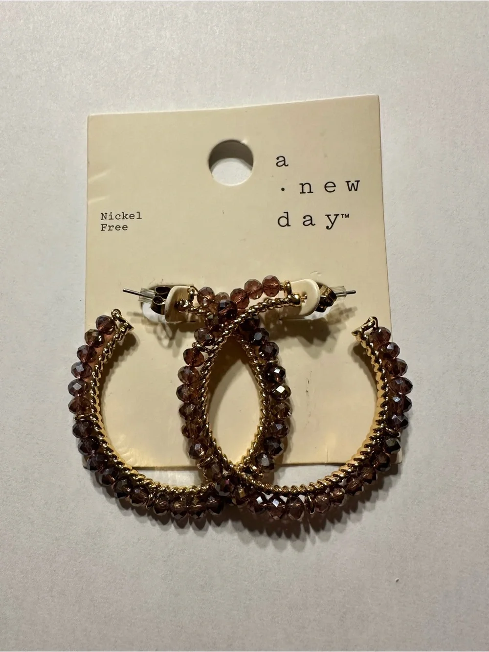 a new day Gold Hoop Earrings with Mauve Crystal Beads